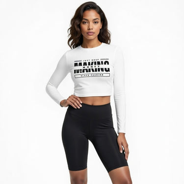 Woman wearing a white long-sleeve crop top with text and black leggings on a white background DGLOX