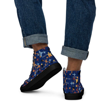 Person wearing colorful high top sneakers with jeans rolled at the ankle, showing the sneaker's canvas upper and EVA rubber outsole.