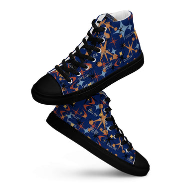Stylish high top sneakers with black faux leather toe cap, blue canvas upper, and unique pattern design featuring stars and branding.